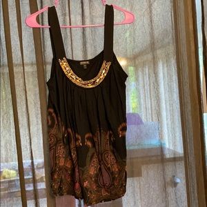 Embellished tank